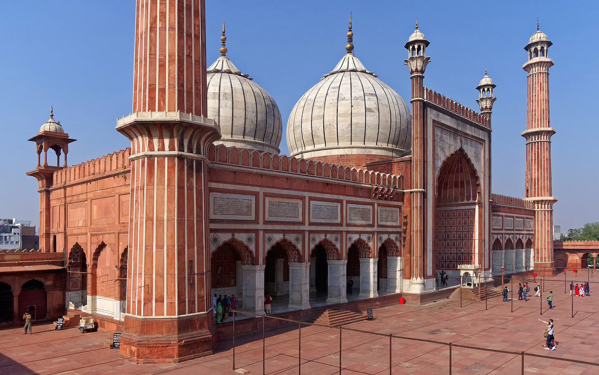 Jama Masjid's red sandstone courtyard and white marble domes