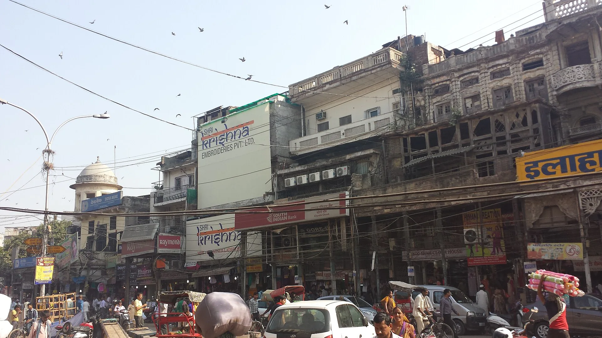 Historic commercial buildings and street life in Chandni Chowk