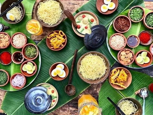 Goan home dining experience with a spread of regional dishes, spices and banana leaves