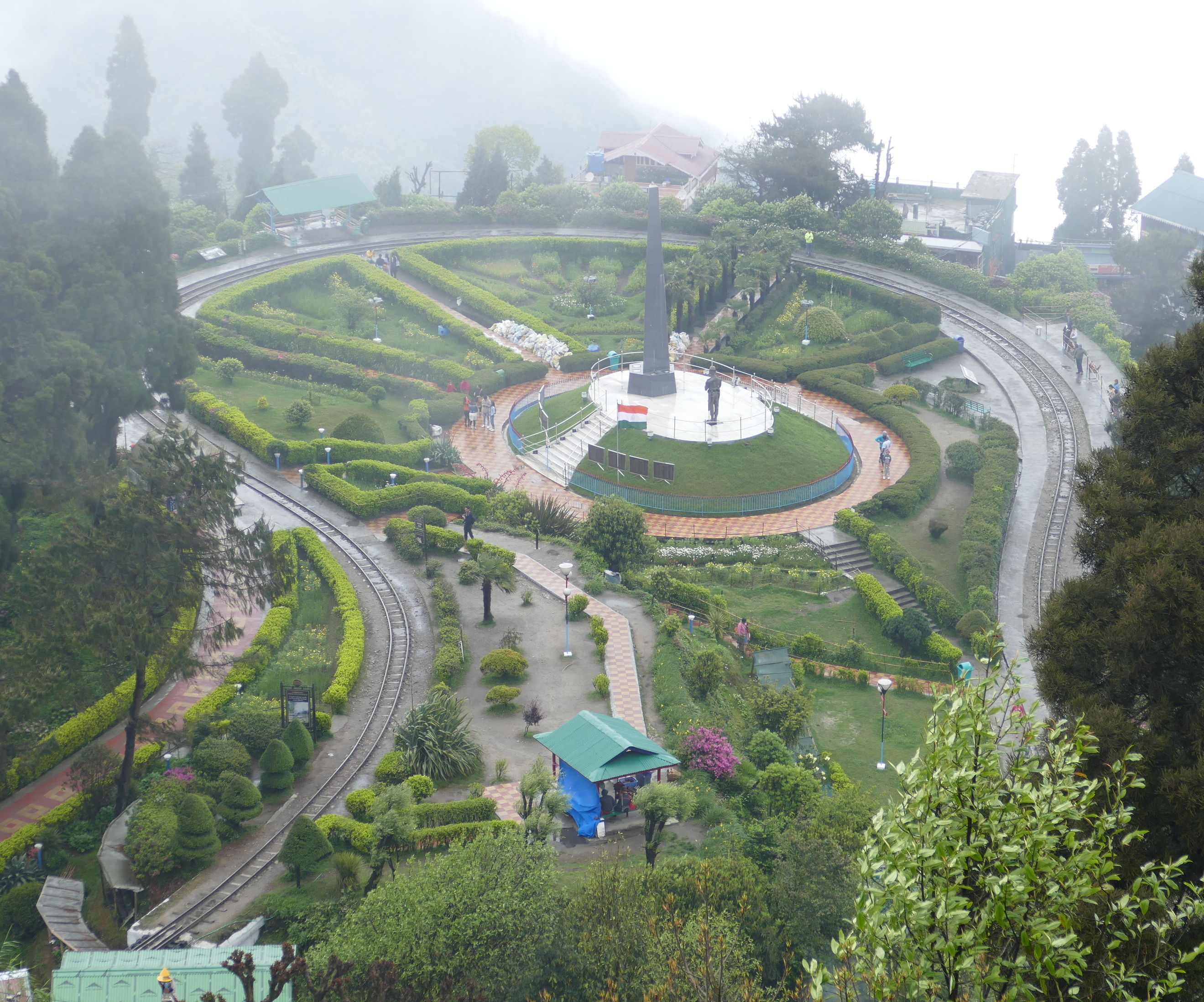 Railway tracks circling Batasia Loop and War Memorial in Darjeeling