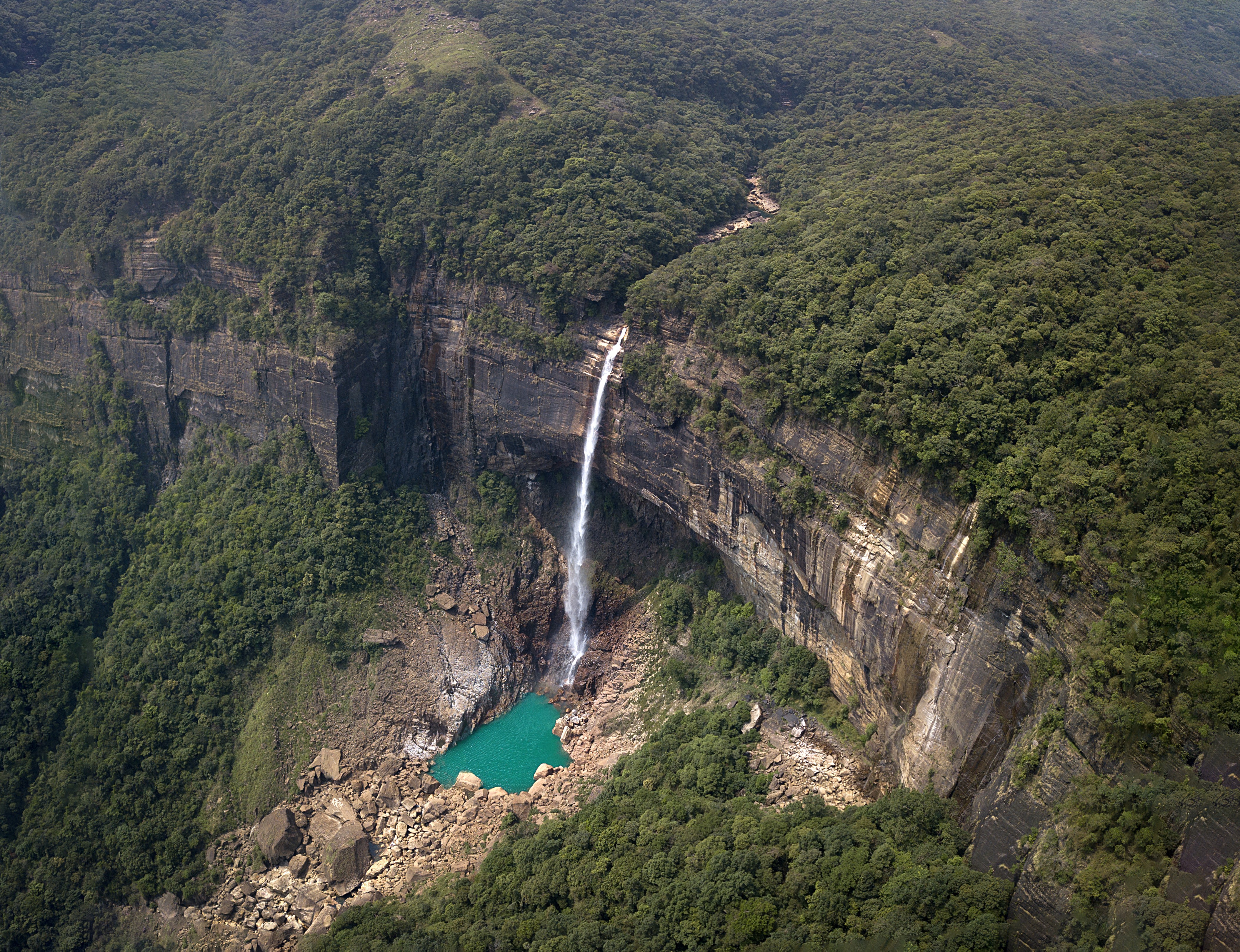 Nohkalikai Falls plunging into a turquoise pool near Sohra, Meghalaya
