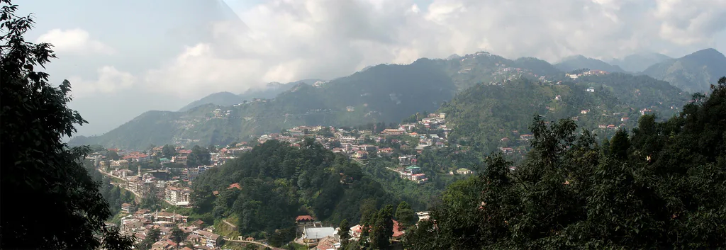 Panoramic view of Mussoorie spread across green Himalayan foothills